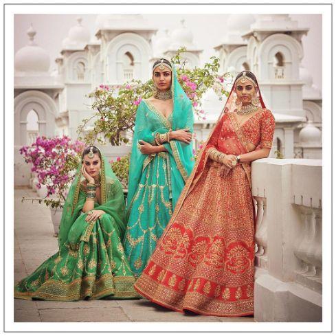 Dulhan in Red Lehenga Elegance: Sabyasachi-Inspired Royal Baggi Collection,  शादी का लहंगा - JMS Studio, Surat | ID: 2853237554573