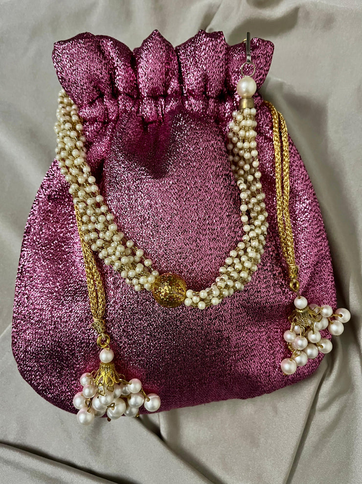 Purple shimmerey potli bag with chain handle