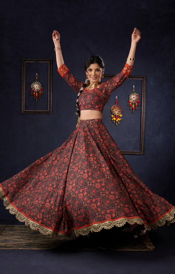 Beautiful Orange Printed Lehenga & Blouse With Mirror Work & Contrast Dupatta.