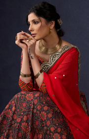 Beautiful Orange Printed Lehenga & Blouse With Mirror Work & Contrast Dupatta.