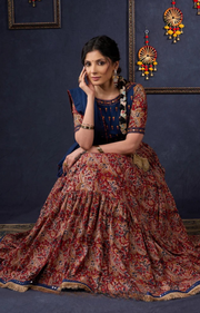 Evergreen Kalamkari Lehenga With Navy Blue Embroidered Blouse & Matching Dupatta.