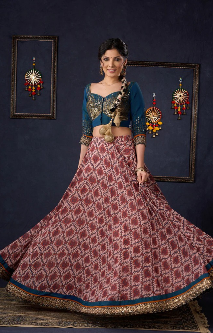 Graceful Printed Lehenga With Gold Embroidered Blouse & Matching Dupatta.