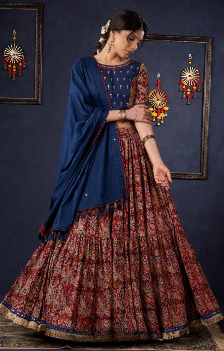 Evergreen Kalamkari Lehenga With Navy Blue Embroidered Blouse & Matching Dupatta.