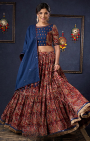 Evergreen Kalamkari Lehenga With Navy Blue Embroidered Blouse & Matching Dupatta.