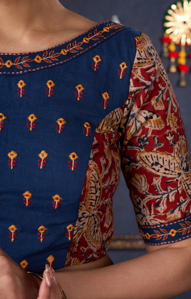 Evergreen Kalamkari Lehenga With Navy Blue Embroidered Blouse & Matching Dupatta.