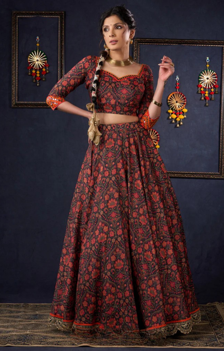 Beautiful Orange Printed Lehenga & Blouse With Mirror Work & Contrast Dupatta.