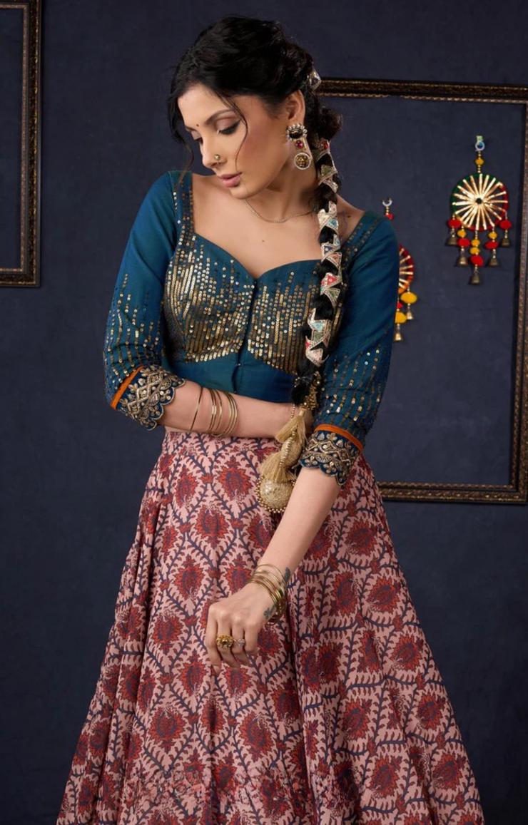 Graceful Printed Lehenga With Gold Embroidered Blouse & Matching Dupatta.