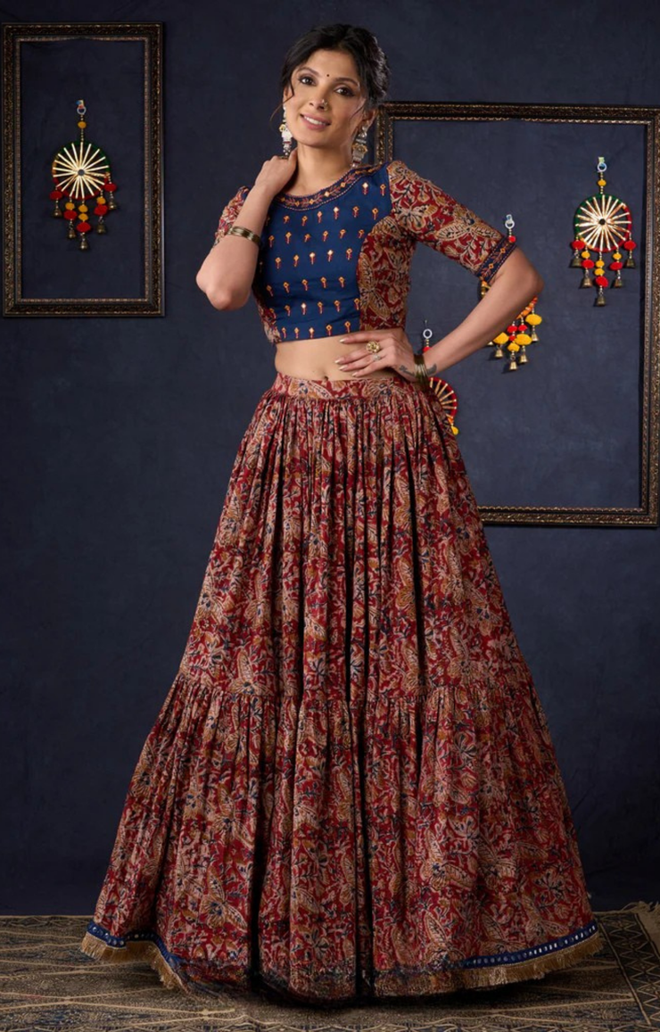 Evergreen Kalamkari Lehenga With Navy Blue Embroidered Blouse & Matching Dupatta.