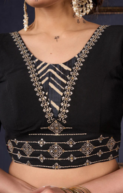 Elegant Black Printed Lehenga With Embroidered Blouse & Net Dupatta.