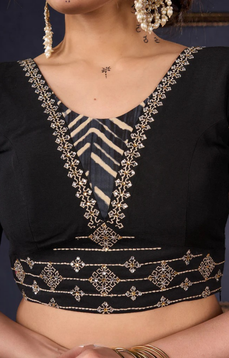 Elegant Black Printed Lehenga With Embroidered Blouse & Net Dupatta.