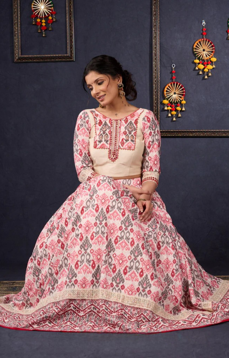 Elegant Off-White & Red Ikat Print Lehenga With Matching Blouse & Dupatta.
