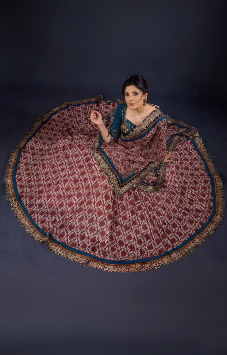 Graceful Printed Lehenga With Gold Embroidered Blouse & Matching Dupatta.