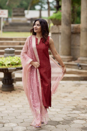 A beautiful maroon checkered kurta set in dupion silk,