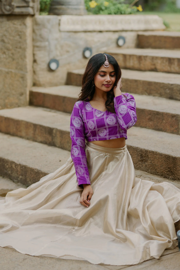 Regal Charm – Purple Crop Top with Golden Flared Skirt