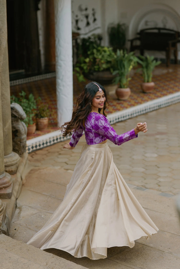 Regal Charm – Purple Crop Top with Golden Flared Skirt