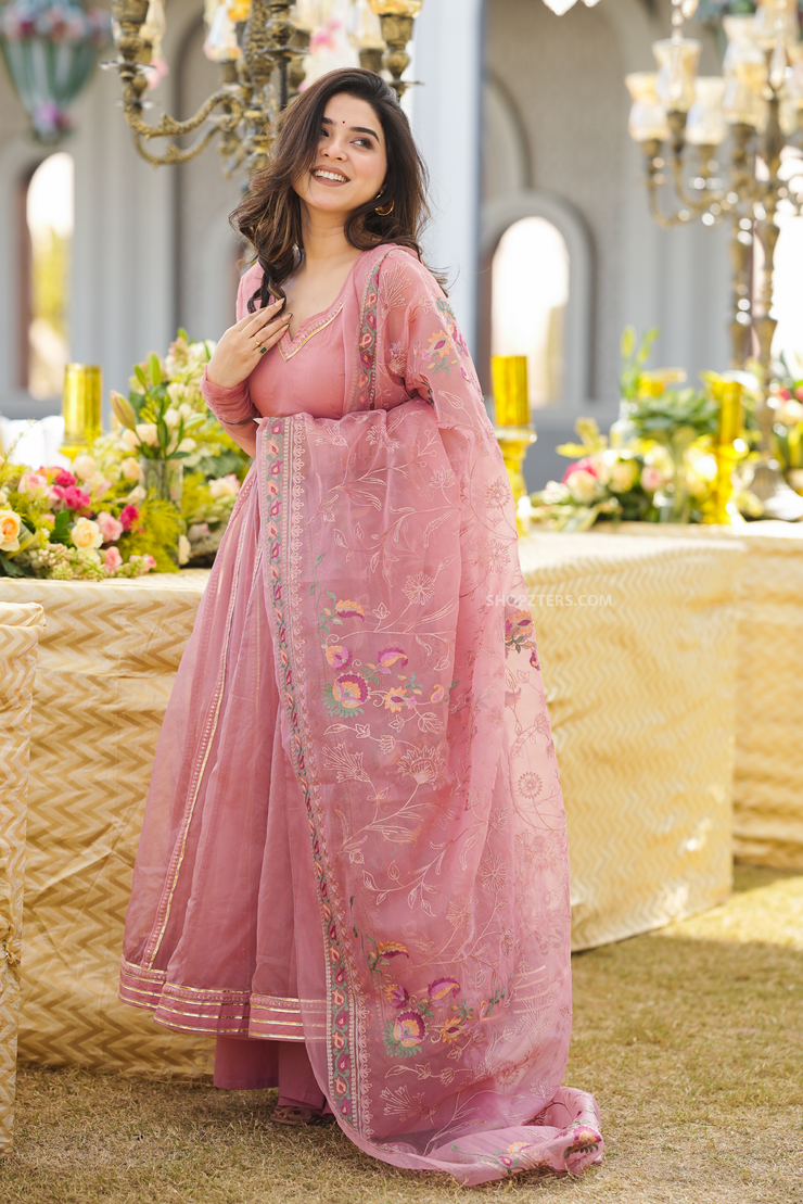 Elegant ethnic wear featuring our Bahara Peach Organza Suit, ideal for festive celebrations.