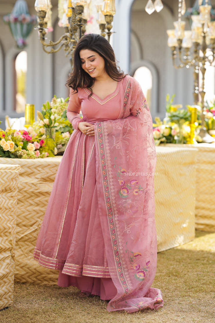 Traditional kurta for women, designed in soft peach organza for an ethereal look.