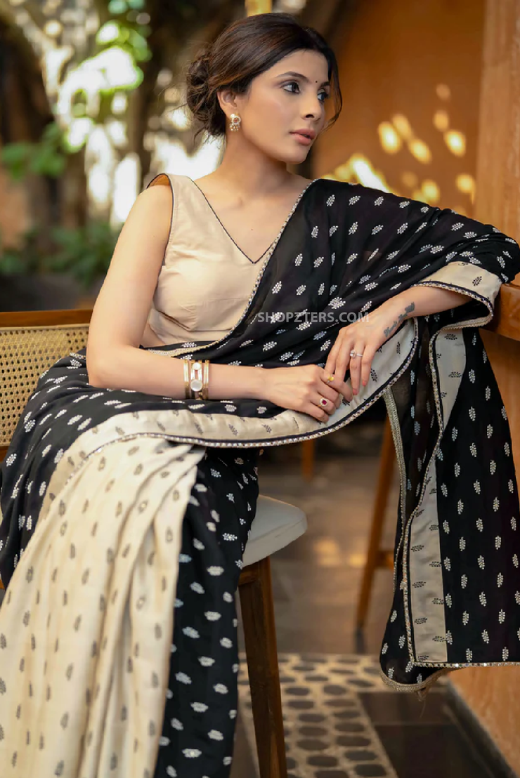 Sophisticated Black and Beige Cotton Silk Saree with Floral Motif Embroidery