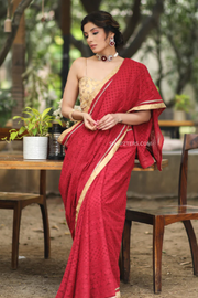 Exquisite Maroon Georgette Saree with Embroidery in Gold and Lace Detail