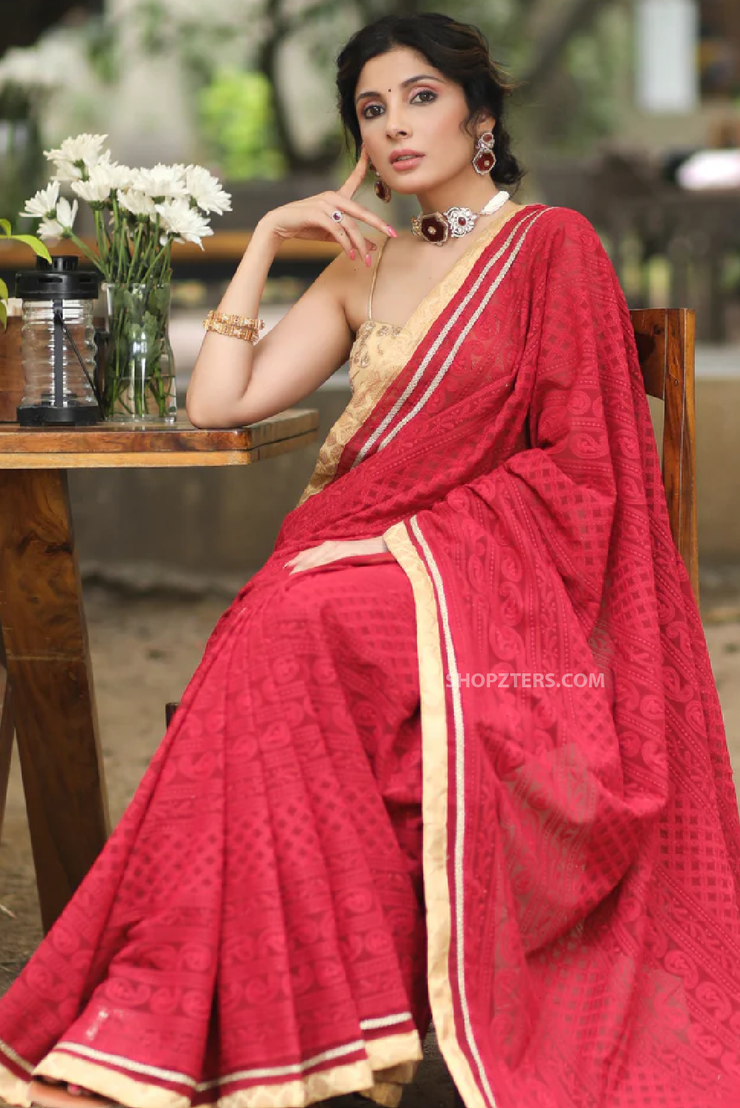Exquisite Maroon Georgette Saree with Embroidery in Gold and Lace Detail