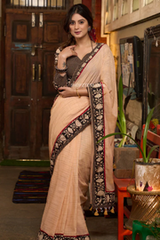 Graceful Pastel Peach Cotton Saree with Beautiful Floral Border