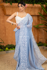 Elegant Powder Blue Organza Saree Highlighted With Overall Intricate Floral Embroidery