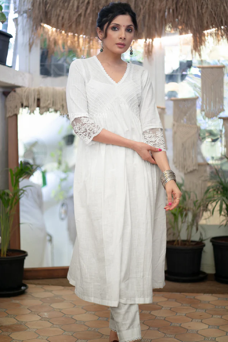 Exclusive white cotton kurta with pintucks on yoke & beautiful lace on sleeves