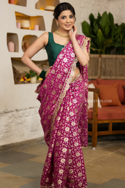Exquisite Magenta Floral Banarasi Saree Highlighted With Beautiful Scalloped Lace