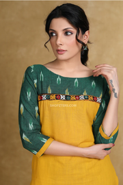 Elegant cotton ikat combination kurti highlighted with mirror lace