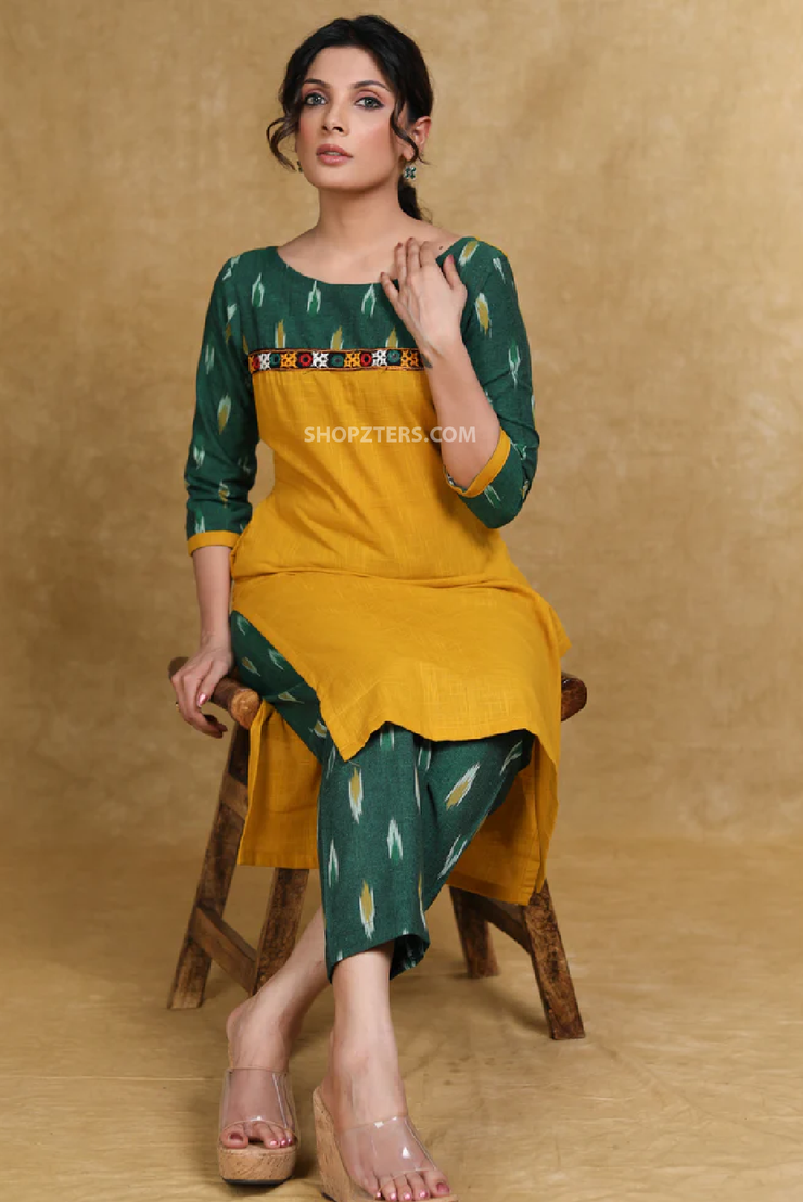 Elegant cotton ikat combination kurti highlighted with mirror lace