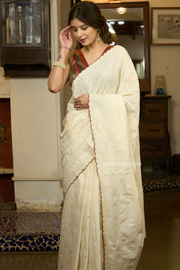 Breezy hakoba cotton saree highlighted with embroidered dots and overall scallops