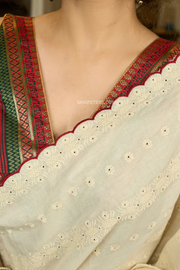 Breezy hakoba cotton saree highlighted with embroidered dots and overall scallops