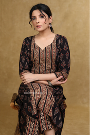 A must-have black cotton kurta set that elevates any woman's ethnic wear collection with its unique patterns.