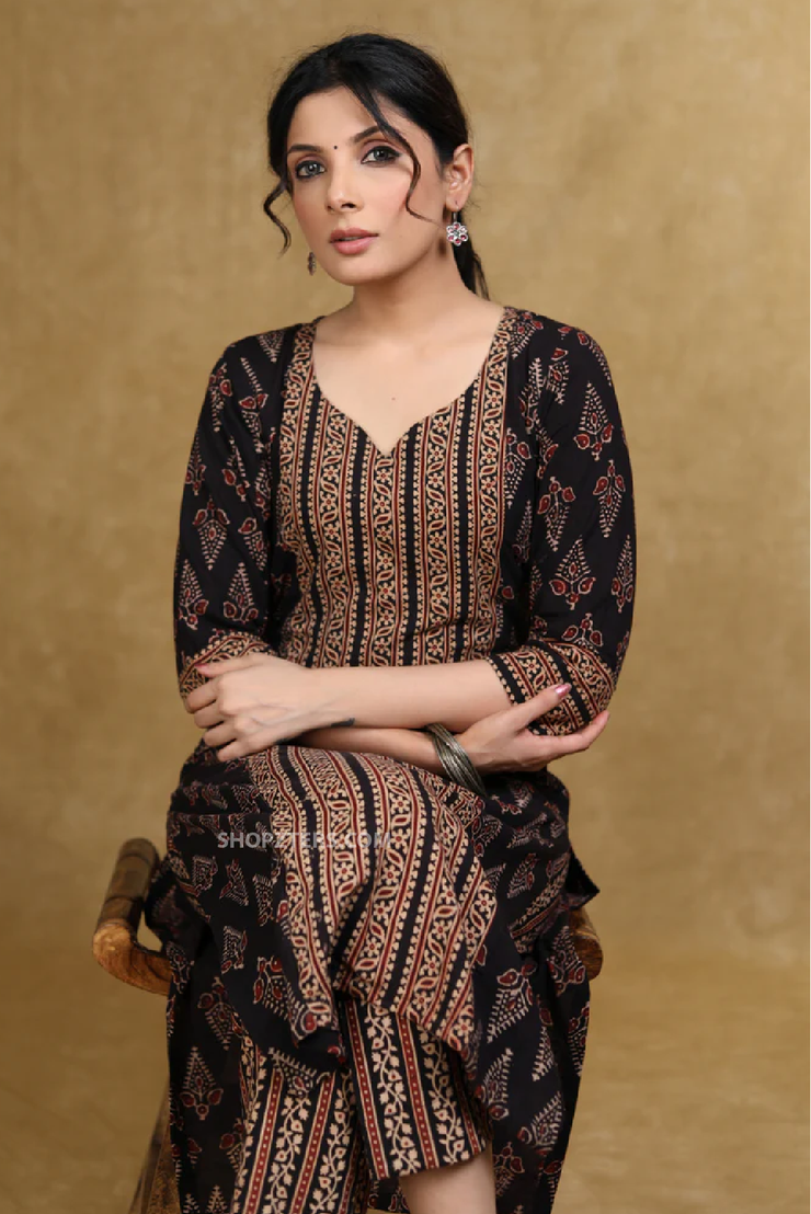 A must-have black cotton kurta set that elevates any woman&