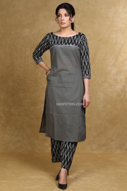 Upgrade your ethnic wear collection with our Smart Gray Cotton Kurta Set featuring a black Ikat design.