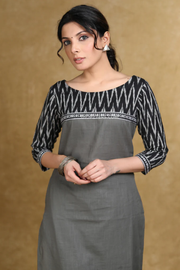 Versatile kurta sets for women, including our gray cotton kurta with a unique black Ikat combination.