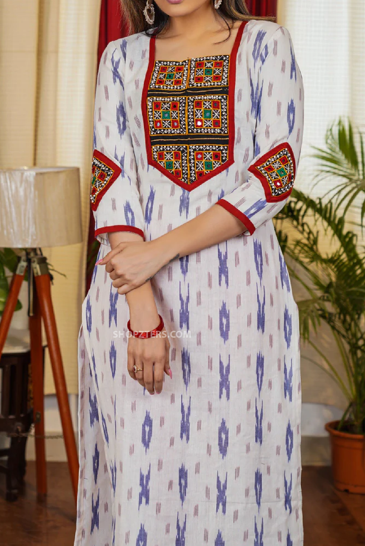 Graceful ikat cotton straight cut kurta with hand made kutch mirror work on yoke and sleeves