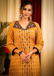 Mustard Color Self Embroidered A-Line Kurta With Mirror work Collar