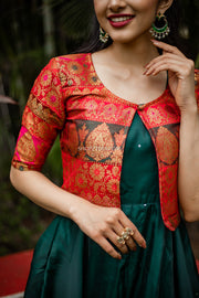 Chic and timeless, our green silk dress with a red brocade jacket embodies the essence of women's traditional wear.