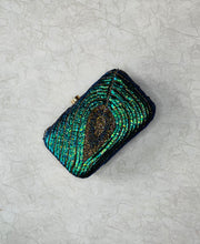 Peacock Sequence Designed Clutch